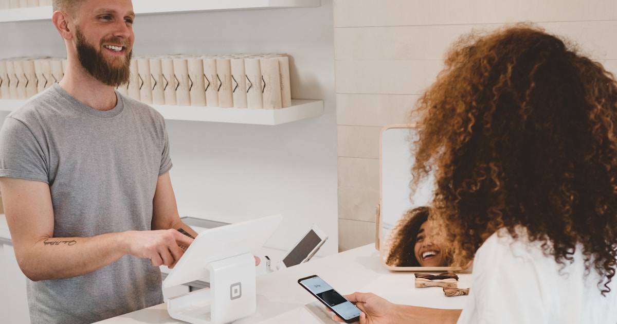Person opening a bank account at an Australian bank branch as a new arrival