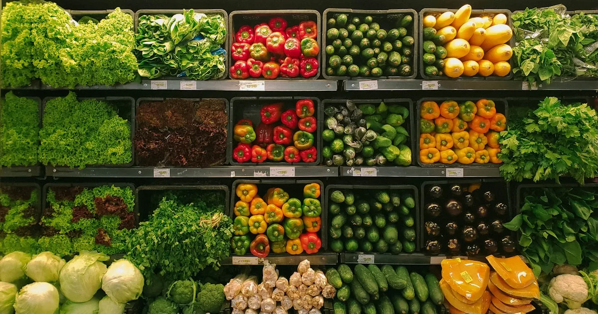Shopper comparing prices at Australian supermarket Woolworths and Coles
